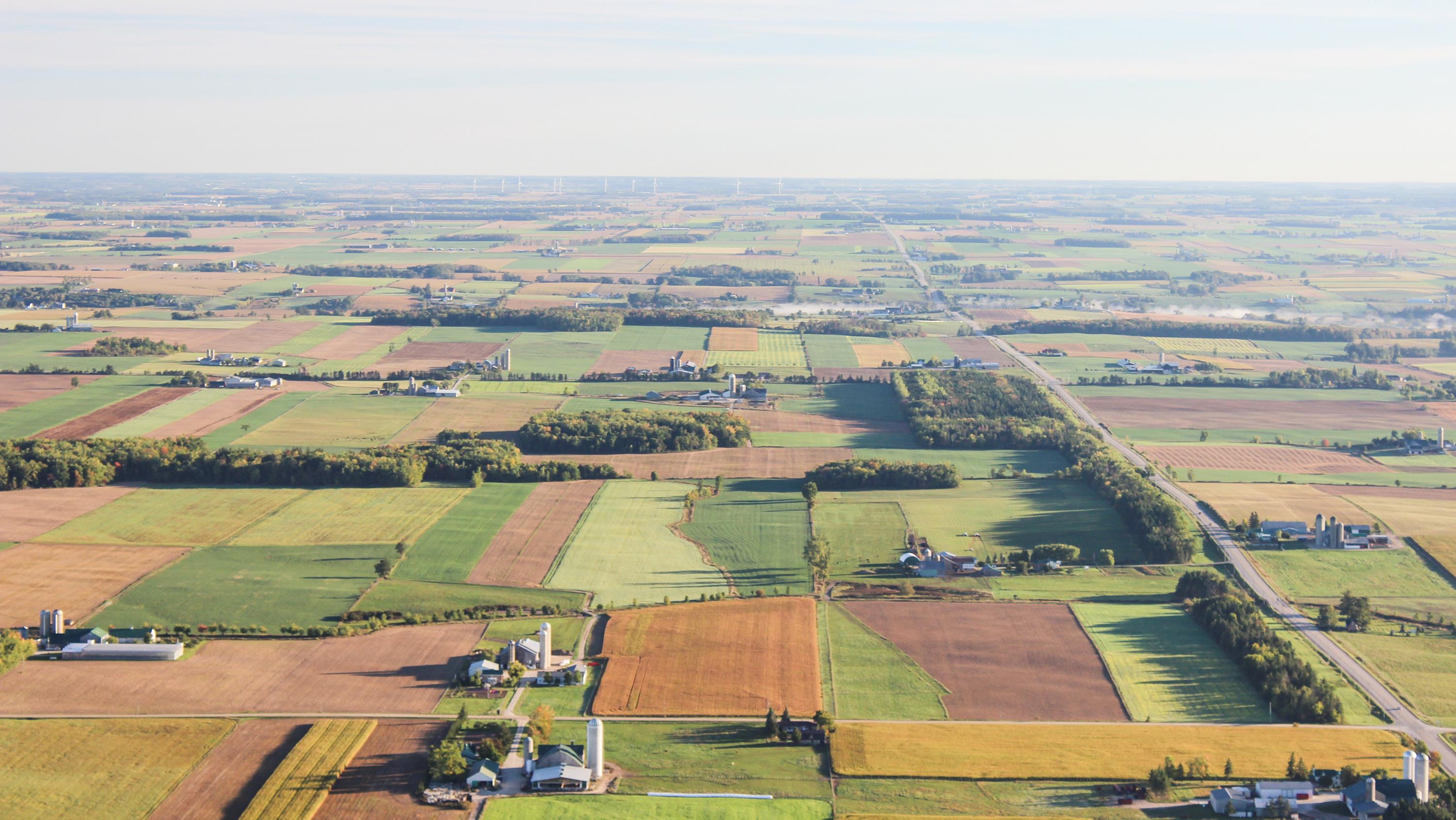 aerial view of a number of farms